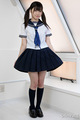 Shizuku wearing kogal uniform pulling at dark blue skirt pigtails falling on shoulders