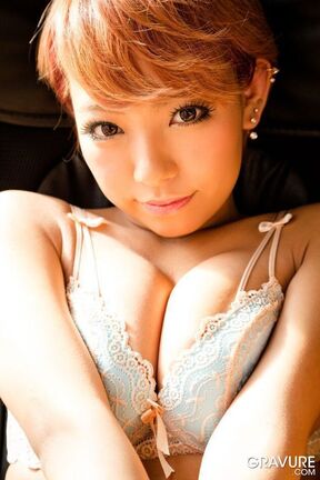 Breasty Hikari strips bra and panties and poses nude