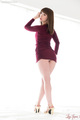 Katou tsubaki looking over her shoulder dress riding up over her panties upskirt panties wearing high heels