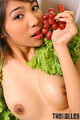 Eating red grapes nice breasts.jpg