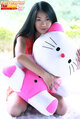 Clutching hello kitty to her chest