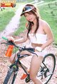 Jean prada sitting on bike wearing crop top in panties