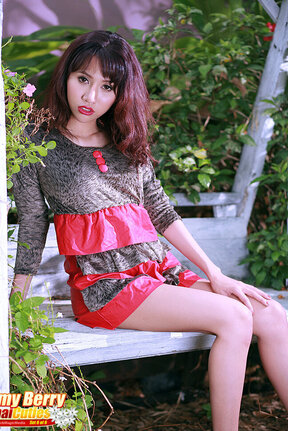 Pretty Amy Berry stripping on bench in high heels