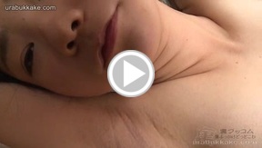 Kotomi on her back receiving bukkake cumshots on her body